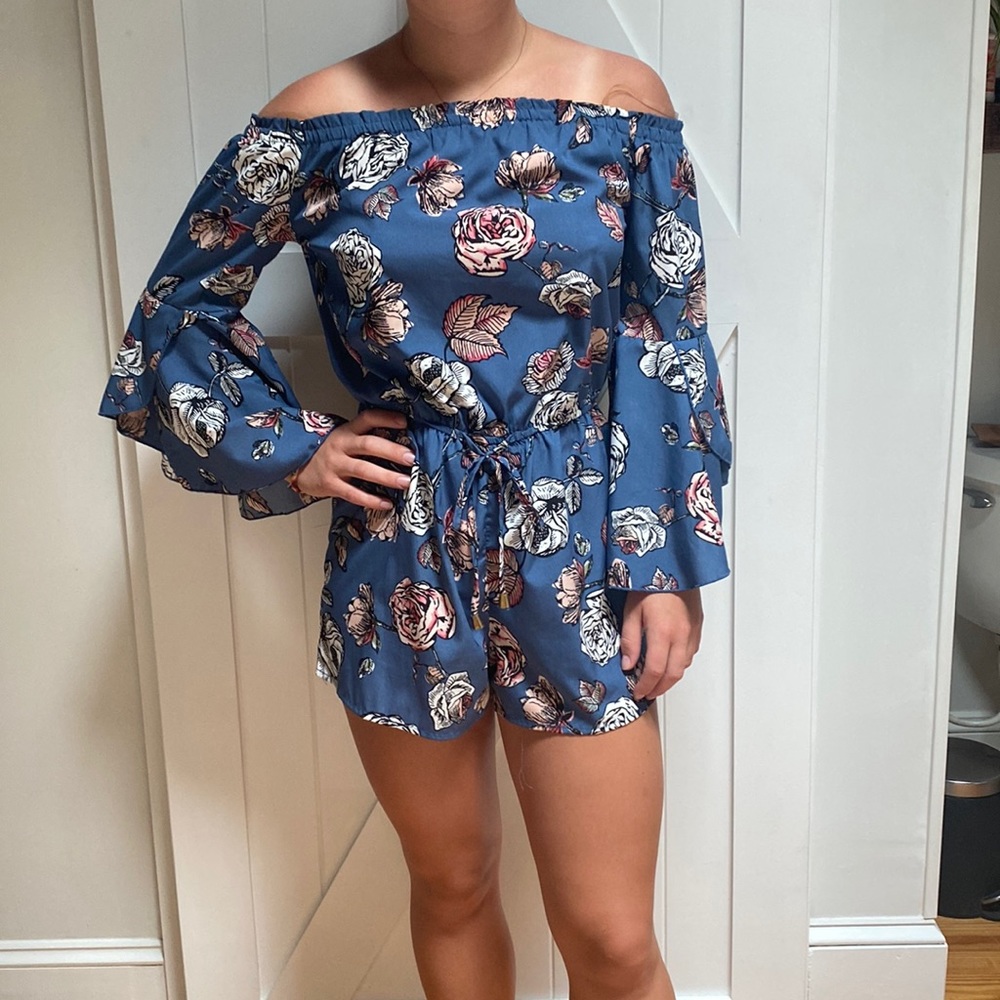 - Blue floral off the shoulder romper with bell sleeves